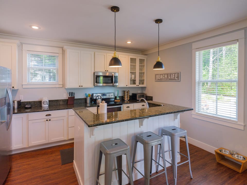 The fully equipped kitchen is designed for effortless meals