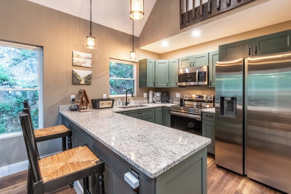 Modern kitchen is well stocked for all your cooking needs