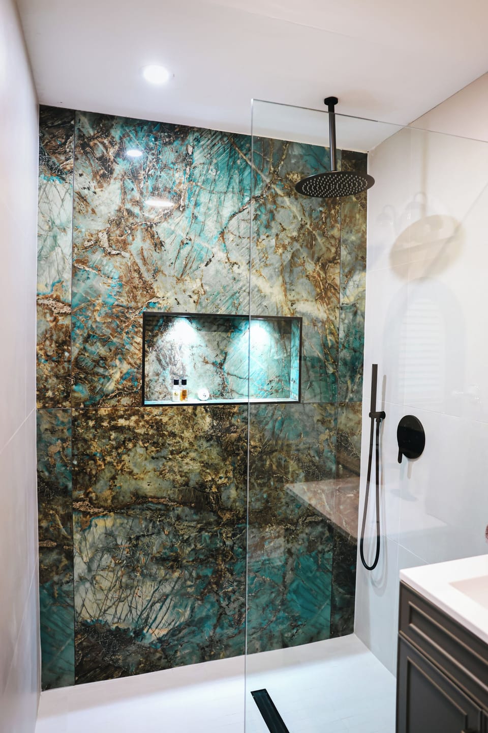Master modern walk-in shower with stunning custom tile and spa vibes