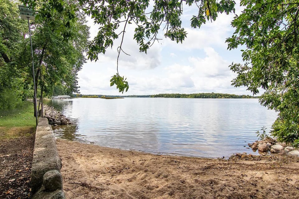 Shoreline with level sandy beach