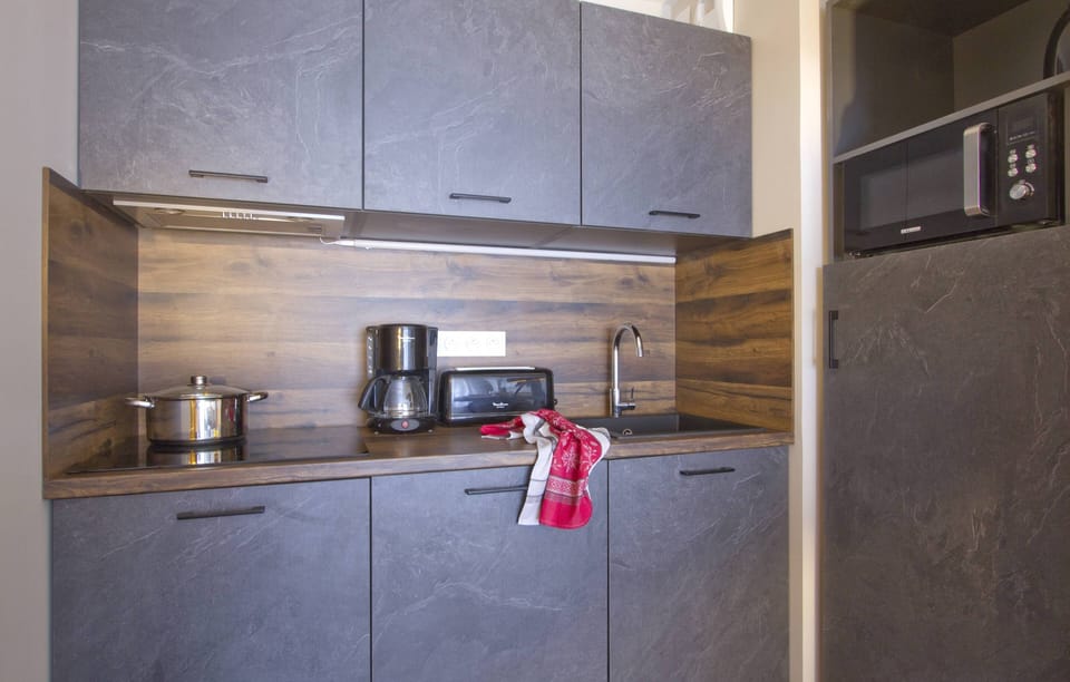 Prepare a small meal in your kitchenette.