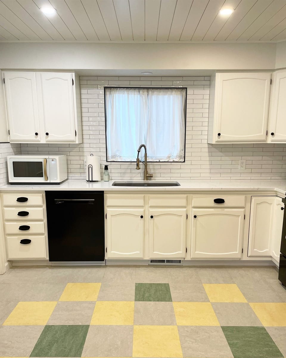 New remodeled kitchen with new tile, new flooring, new stone counters 