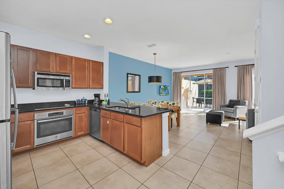 Spacious kitchen overlooking the living room and dining area