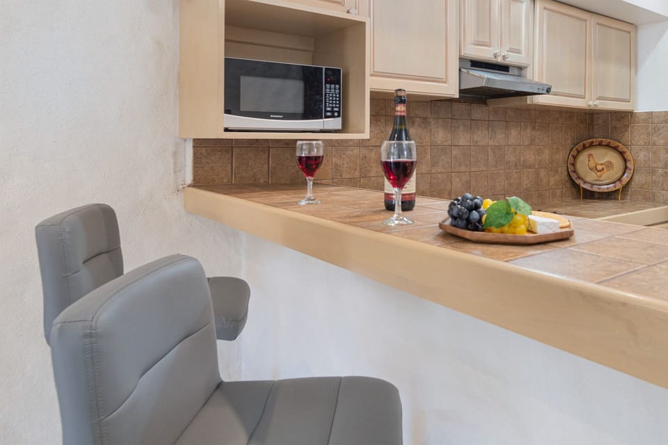 Kitchen counter with bar stools