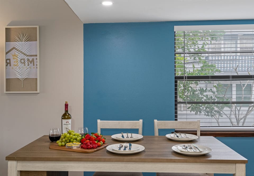 The chairs, carefully chosen for their comfort and aesthetic appeal, offer the perfect balance of support and relaxation, ensuring that every meal is savored in utmost comfort.