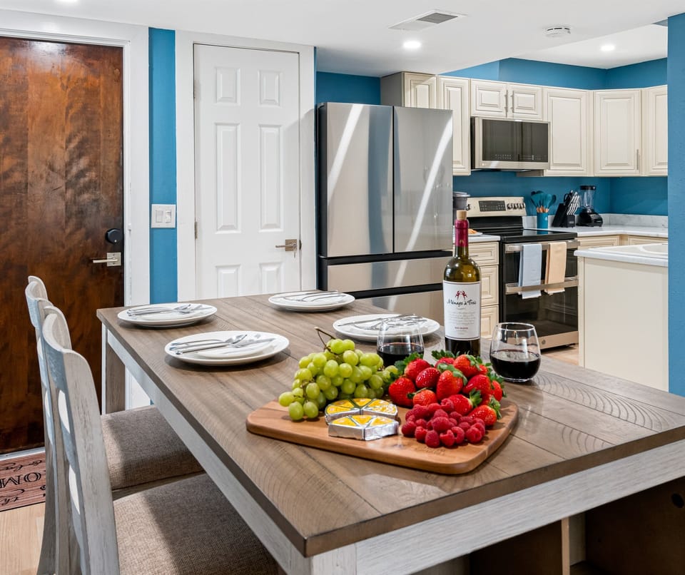 The dining area seamlessly blends with the surrounding kitchen, allowing for easy and convenient access to culinary delights.