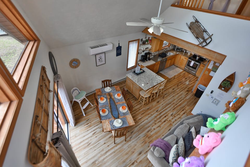 View from the loft looking down to the dining table below.