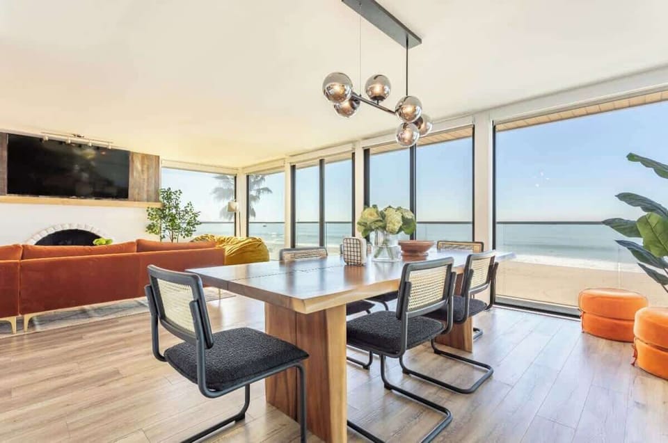 Elegant dining area with a cozy ambiance, ideal for enjoying meals with a view of the ocean.
https://www.youtube.com/watch?v=TlO2KiY2tow