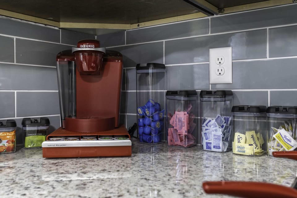 Keurig with free coffee, sugar, cream and sugar substitutes