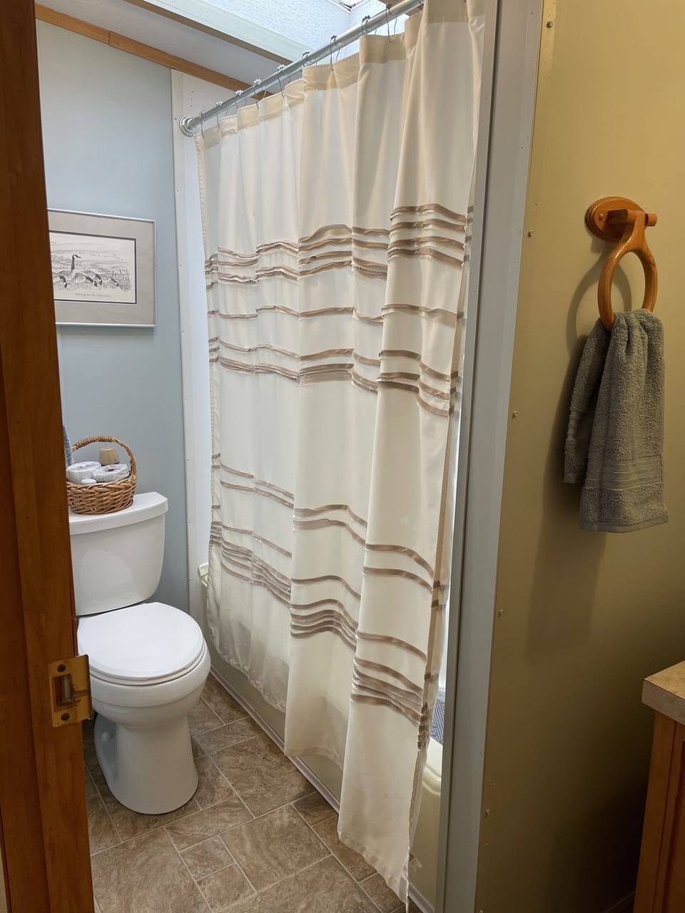 Full bath. Washer and dryer are located outside of this room.