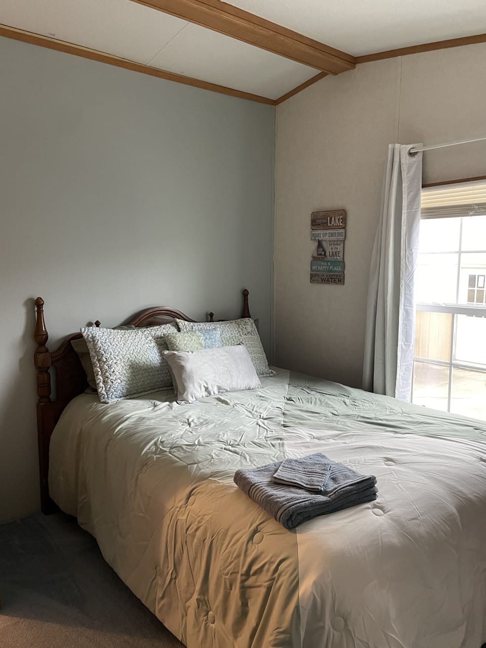 Third bedroom has a queen bed, dresser and walk in closet.
