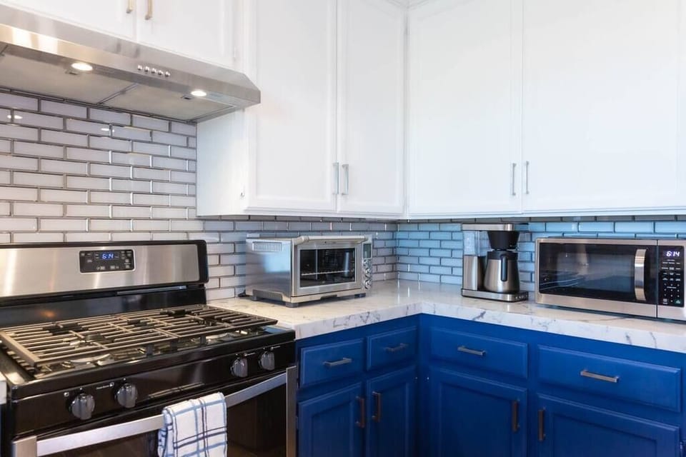 Brand new range, toaster oven, coffee maker and microwave. 