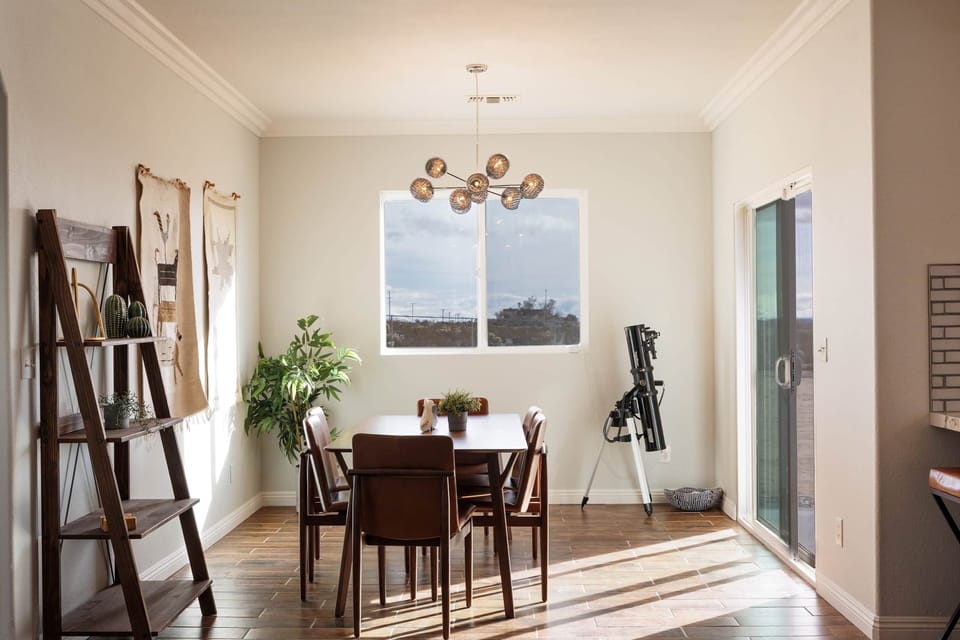 Telescope, sliding door to covered outdoor space and beautiful lighting in our dining room.