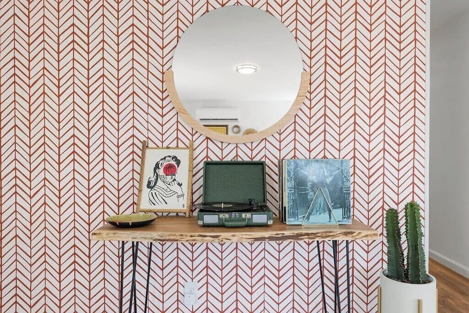 DJ Booth, complete with a record player and some of your fave hits.