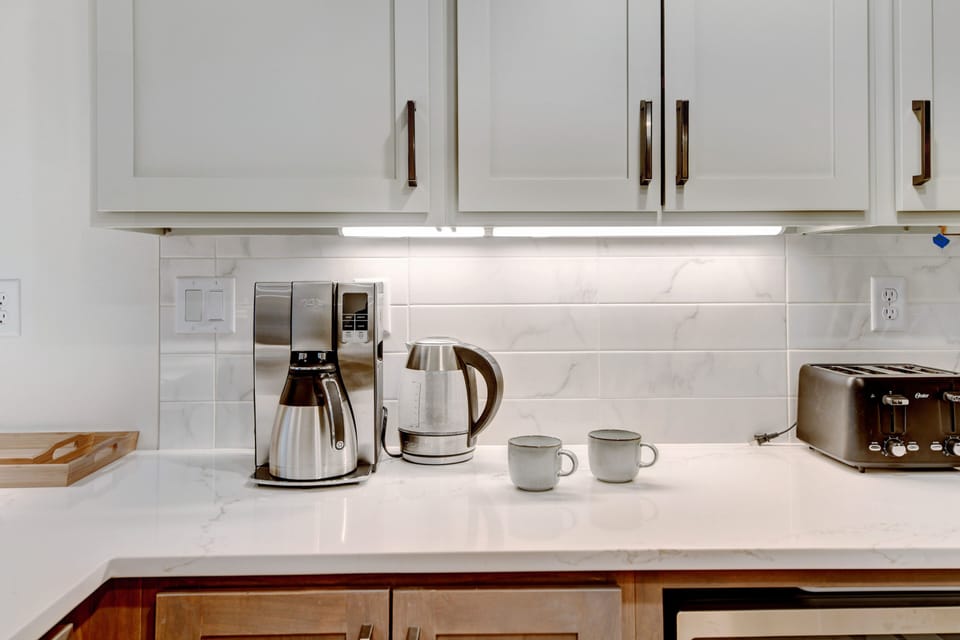 Sleek White Custom Slab Granite Countertops