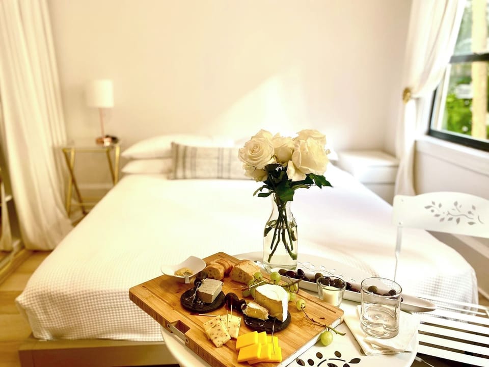 Queen size bed. Windows, enters natural sunlight