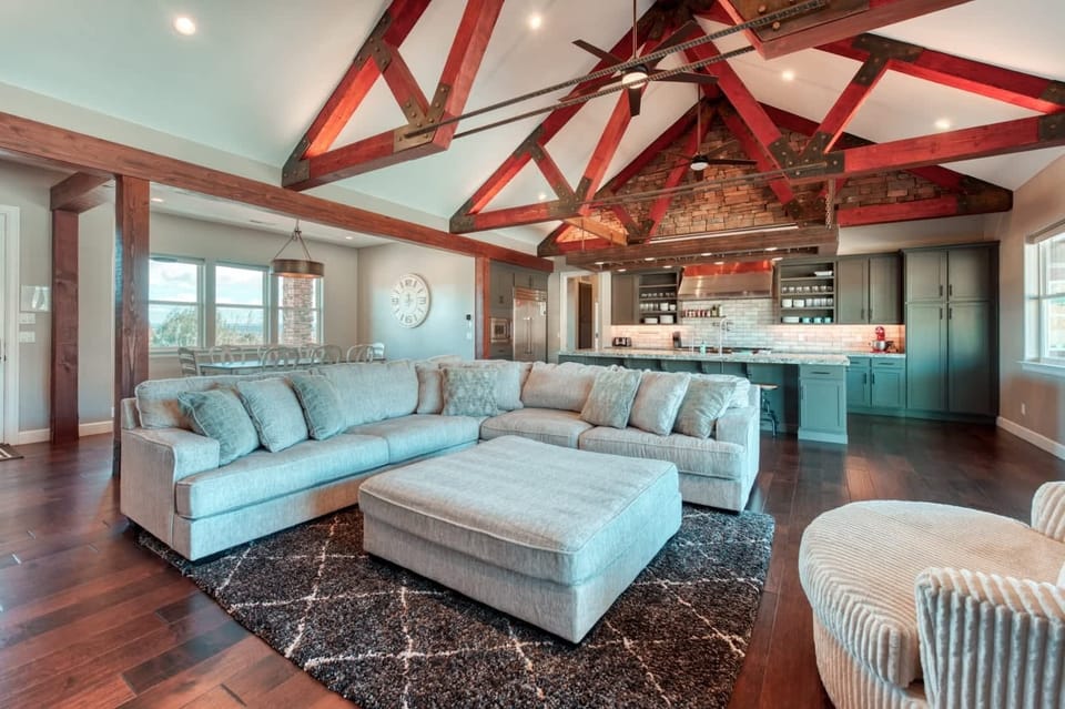 Step into the living room and be wowed by the soaring vaulted ceilings and modern open floor plan.