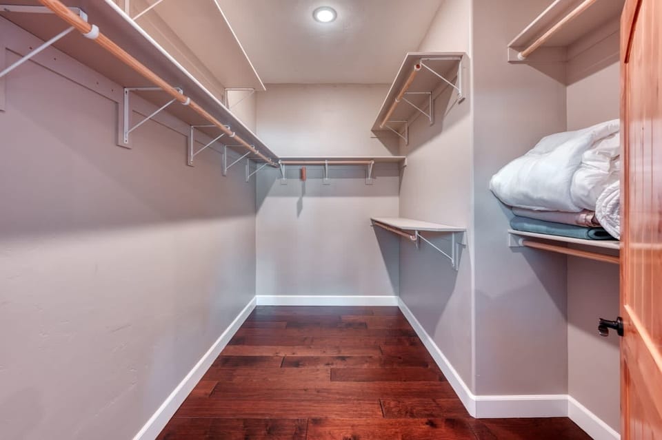The generous walk-in closet makes storing your belongings a breeze.