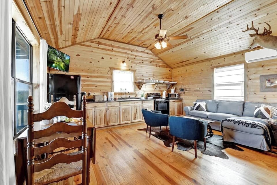 Open concept living room, dining area and kitchen