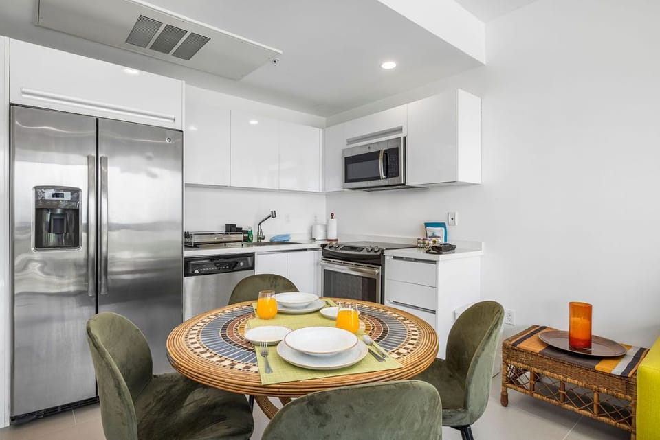 Your fully-equipped modern kitchen awaits, complete with stainless steel appliances and everything you need to prepare delicious meals during your stay.