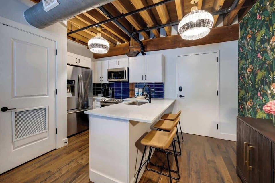 Warm vibes in this cozy kitchen - wooden ceilings and floors make it a rustic dream come true! 🌿 #RusticCharm