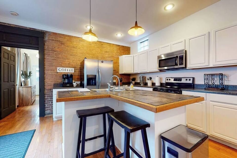 Kitchen: Our spacious kitchen comes with all the essentials you need to prepare delicious meals during your stay. From cookware to utensils, we have you covered for a smooth cooking experience.