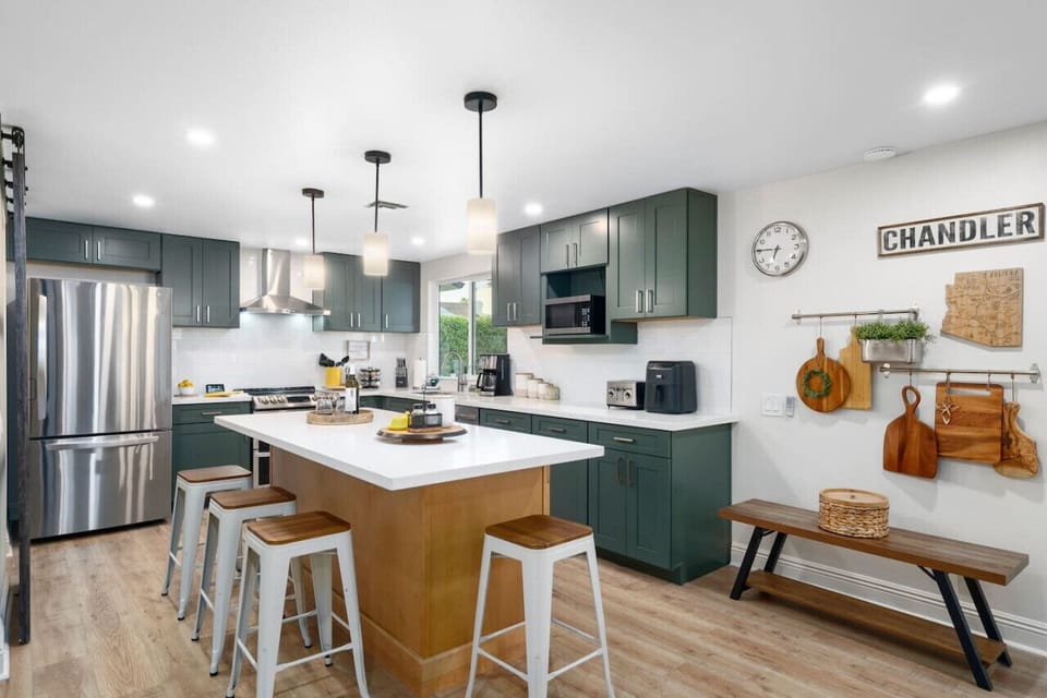 Fully stocked kitchen including spices & fully remodeled kitchen area. A quick snack at the kitchen island.  Seats 4.