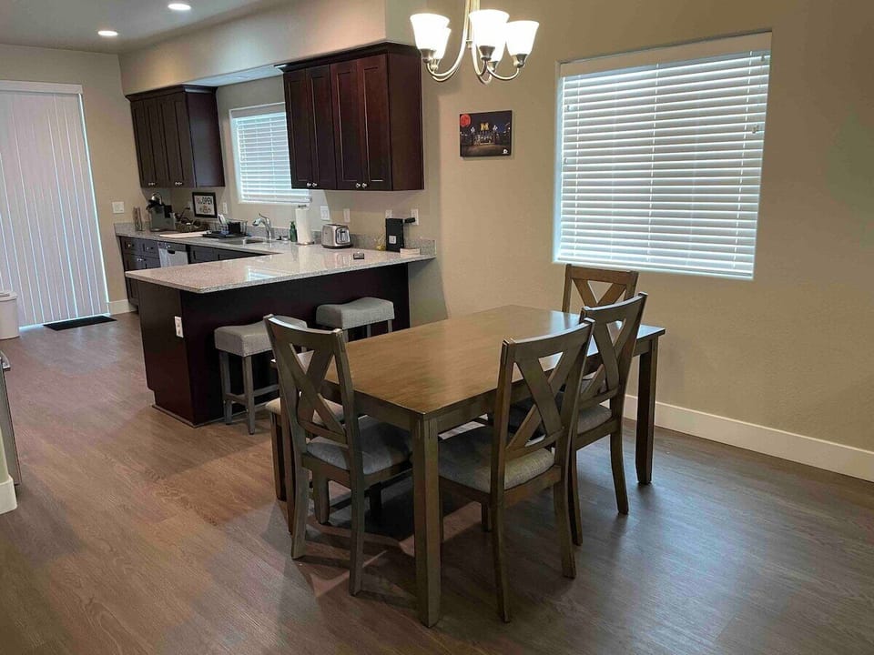 Dining room with seating options for up to 8 guests. High chair and booster seat available for our younger guests. 