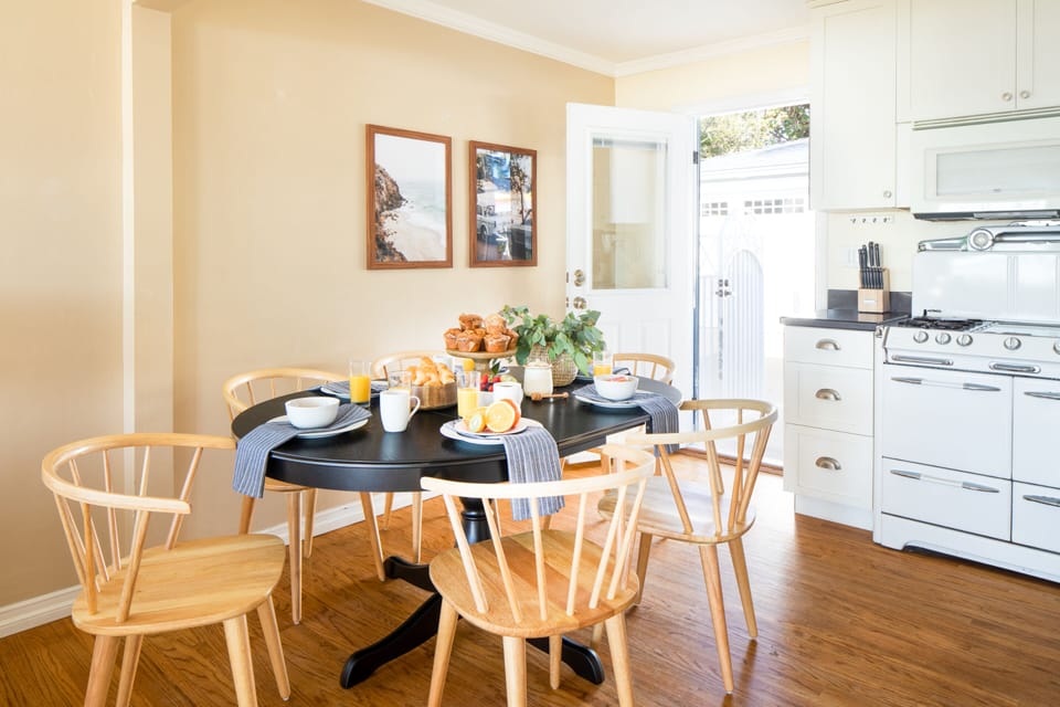The dining area opens to the kitchen.
