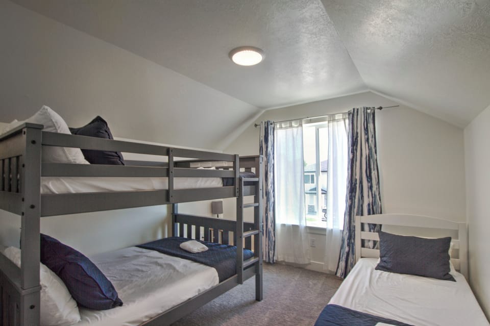 Upstairs Bedroom #5 - Full over Full bunkbed + Twin bed (Northest Bedroom) - this bedroom shares a bathroom with the other bunkroom. Only bedroom without a TV