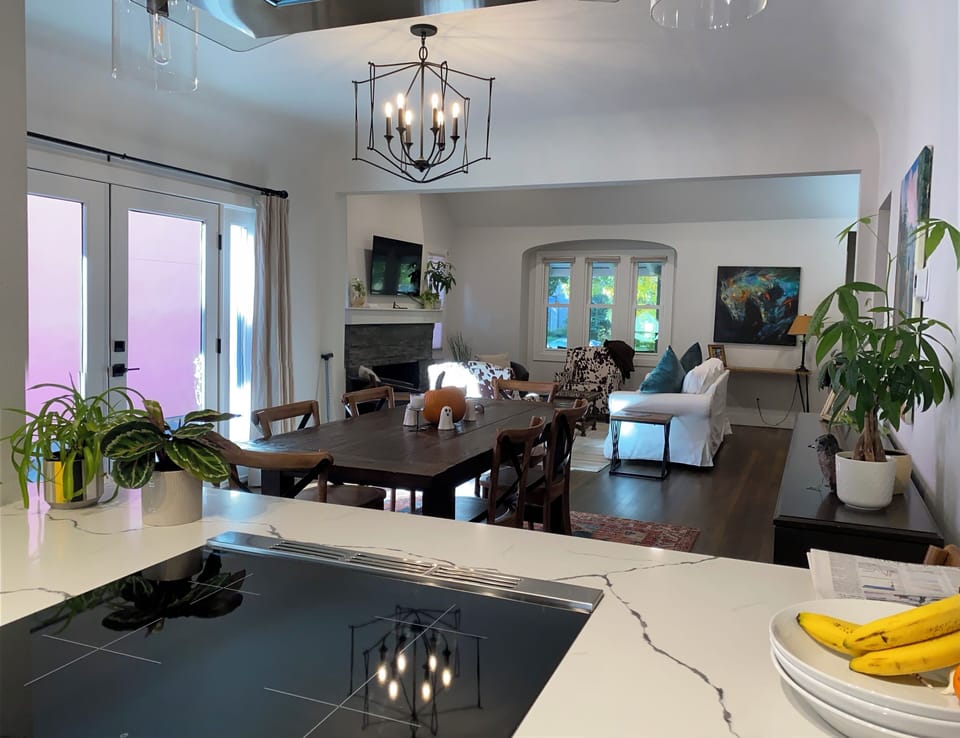 View from Kitchen across dining room and living room.