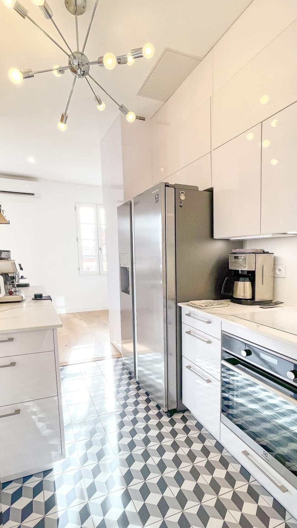 Side by side refrigerator with freezer and featuring a handy ice and water dispenser.