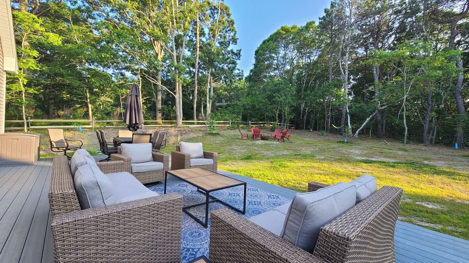 Nice deck with lounge seating and dining table