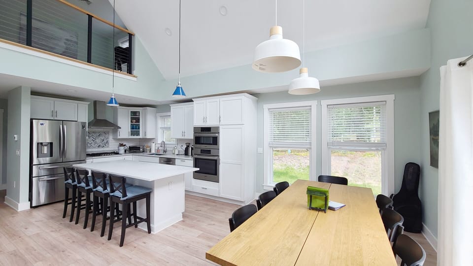 Dining area with with the kitchen beyond