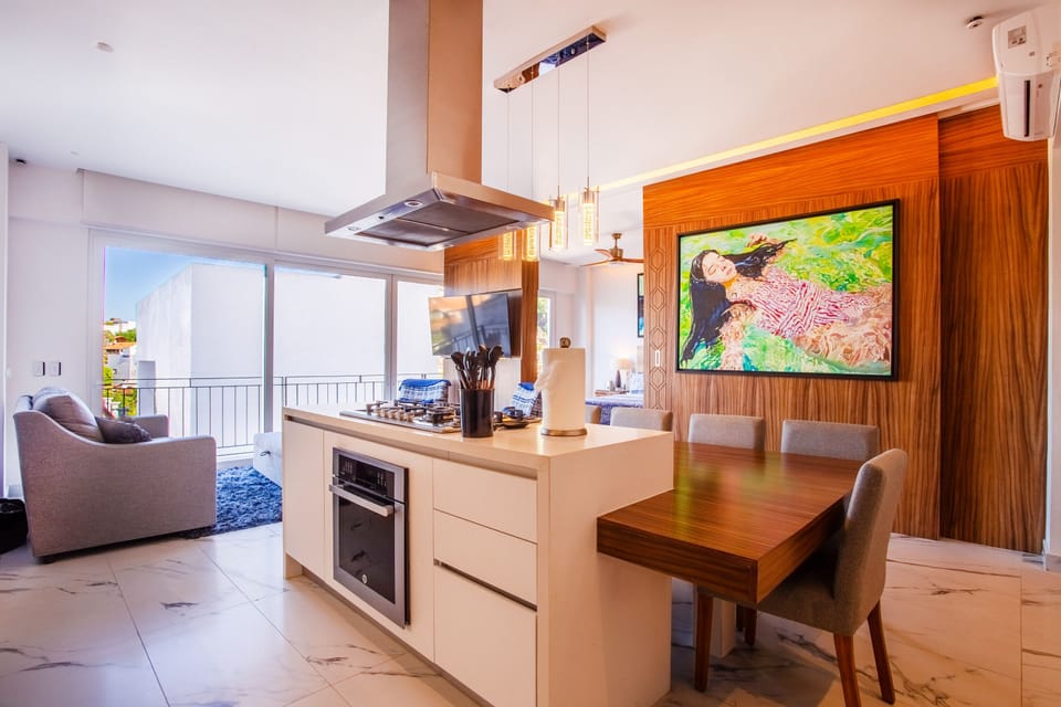 Kitchen amenities include a full-size refrigerator, stove, oven and dishwasher