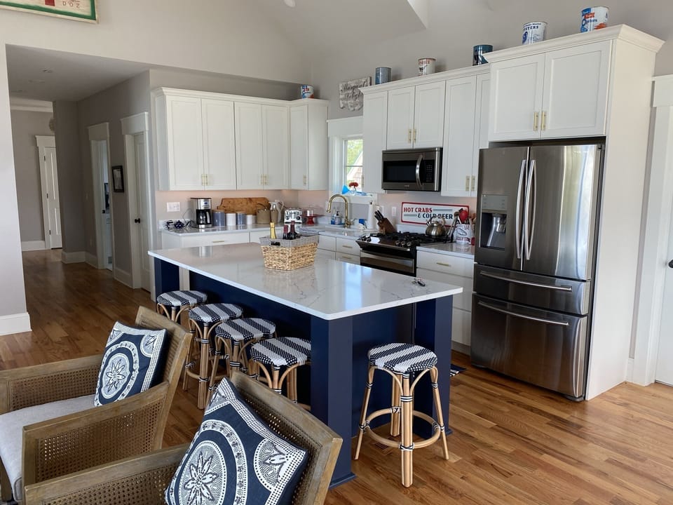 Kitchen with coffee maker, toaster, microwave, pots/pans, all necessities. 