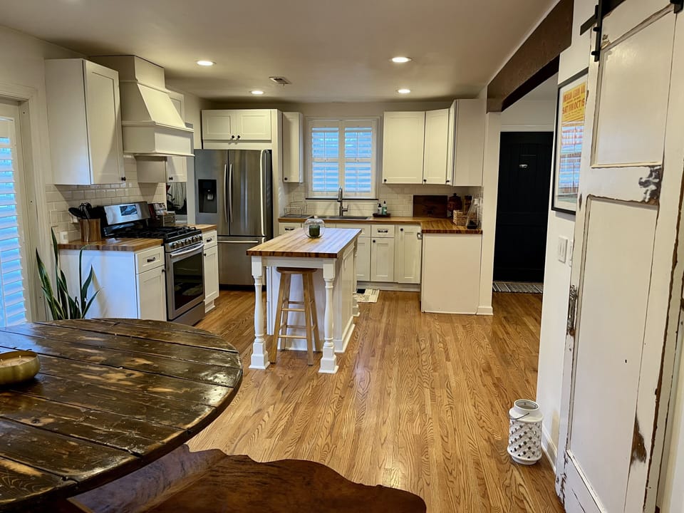 Large kitchen with island can readily accommodate socializing. 