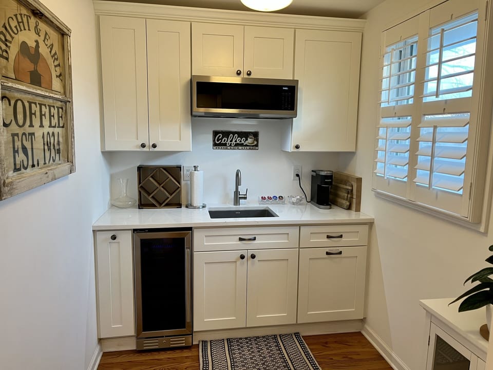 The Butlers pantry includes a wine/beer refrigerator and Keurig coffee maker. 