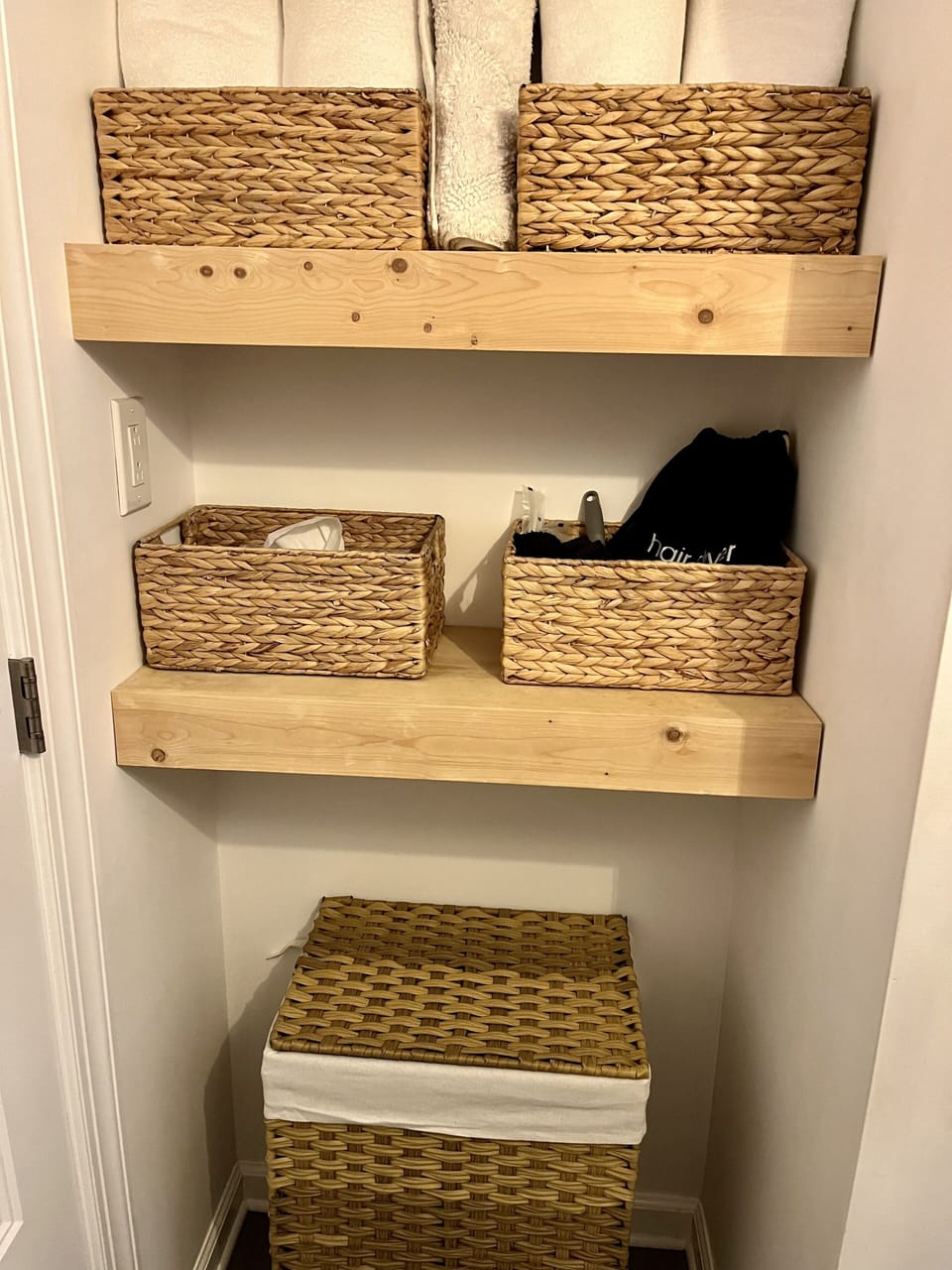 Clean towels, hair dryer, laundry basket and more bathroom accessories!