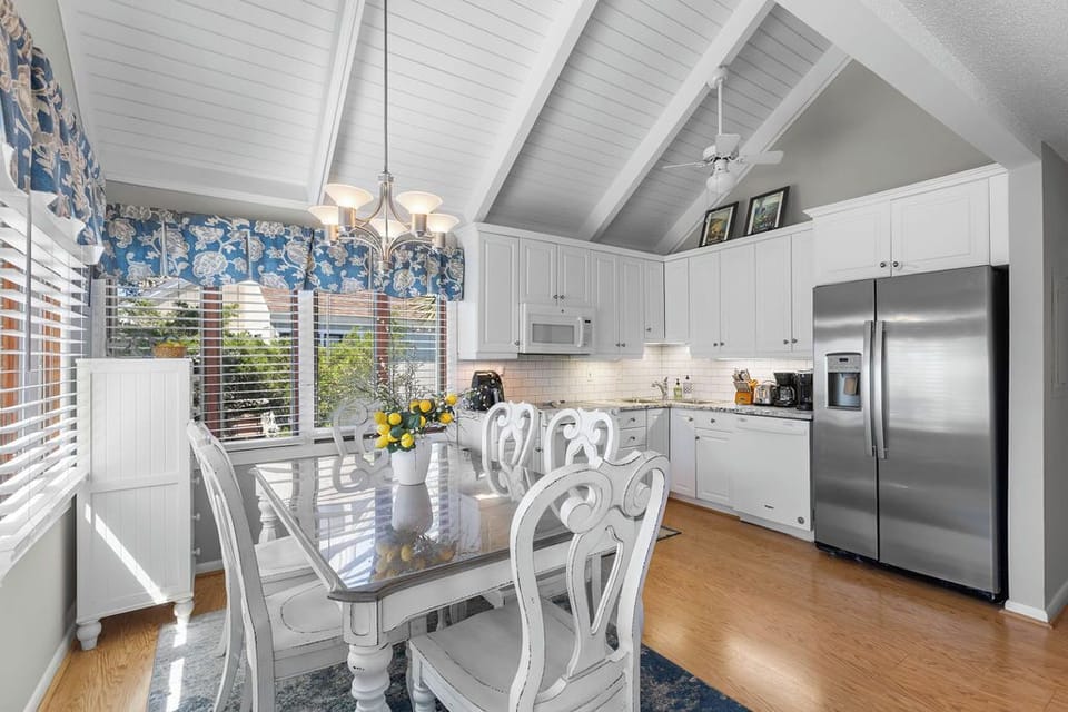 Open dining and kitchen space.  Table seating for six.