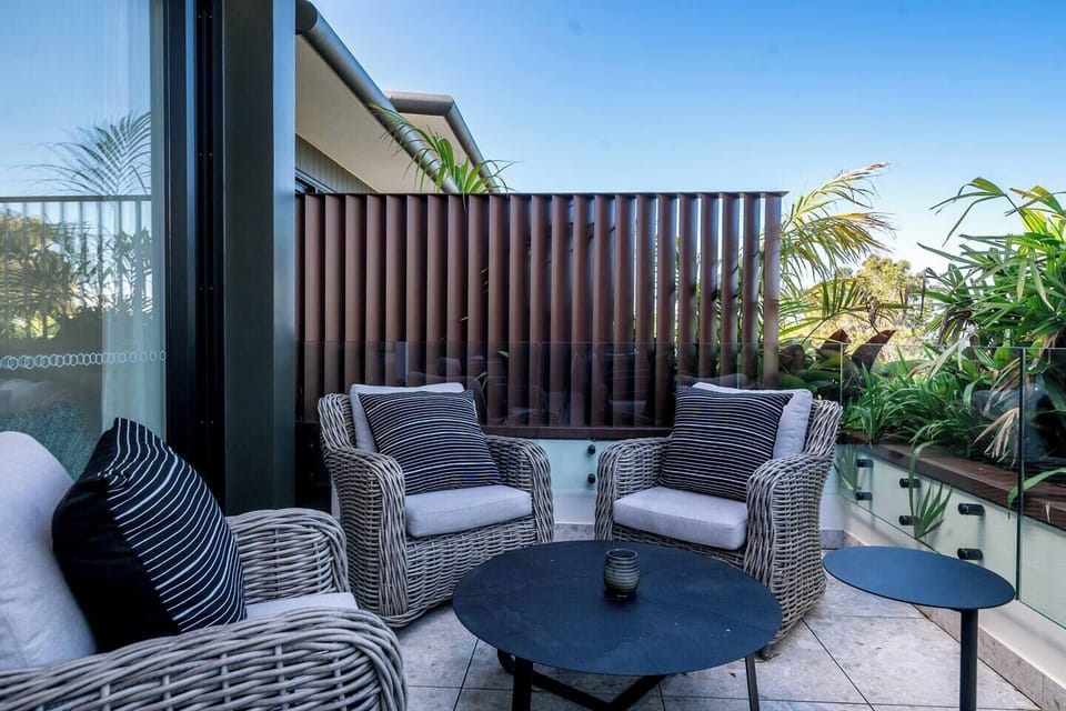 Large balcony with leafy views
