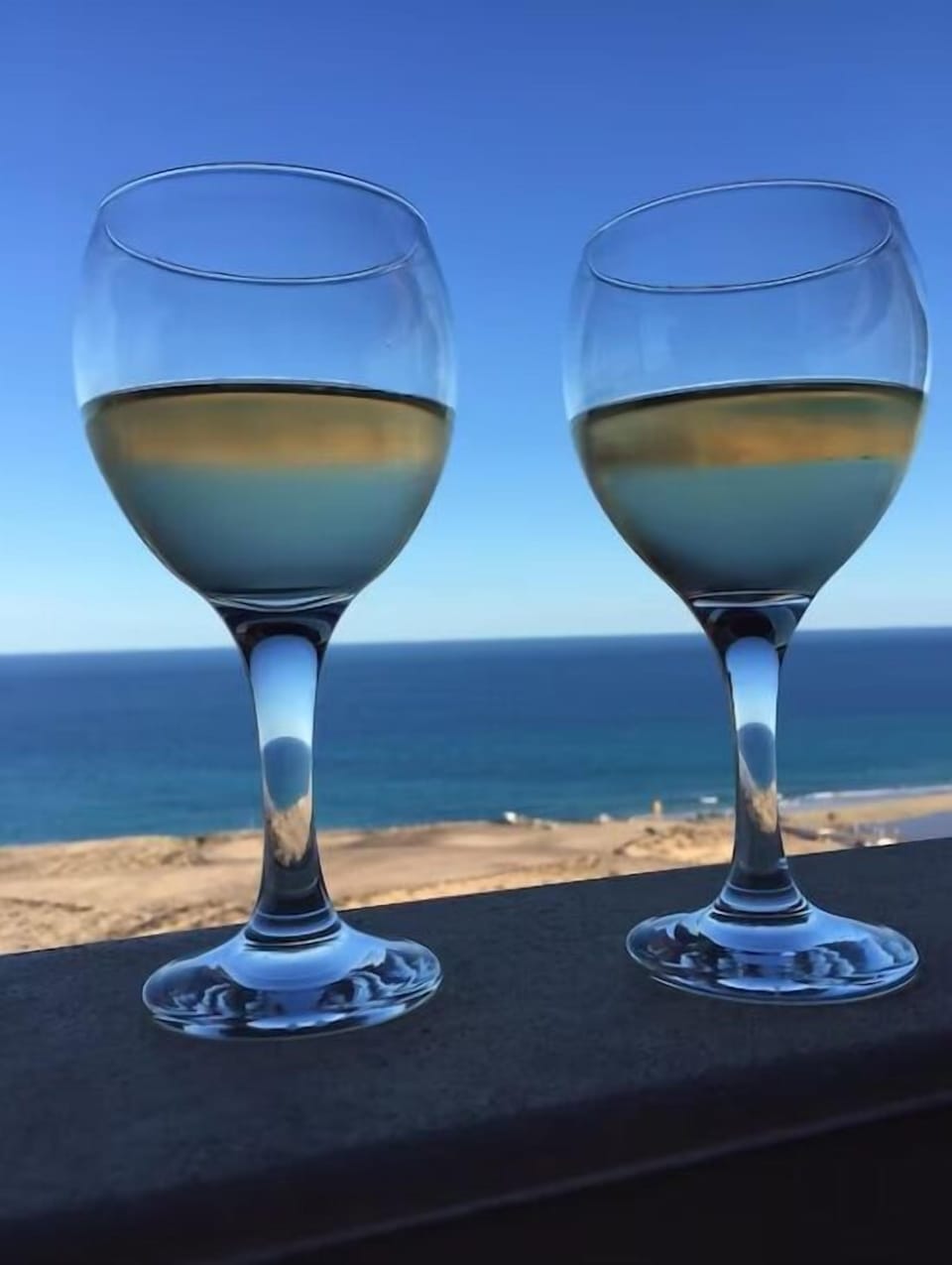 Enjoy a glass or two of vino on the private balcony.