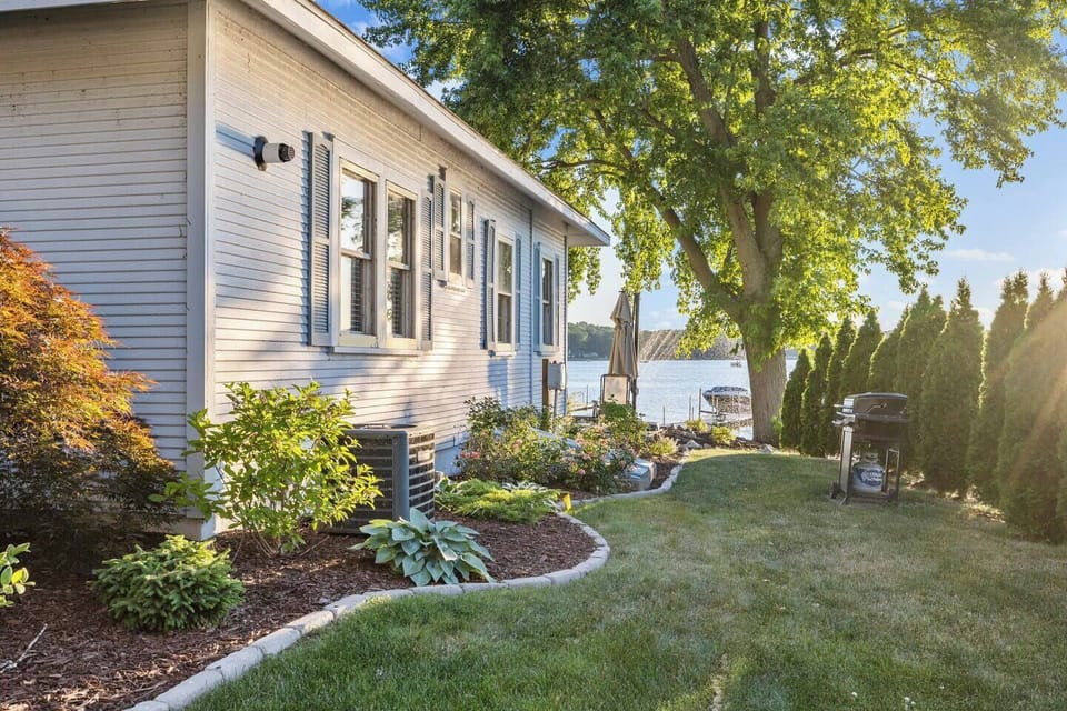 Side yard and garden with grill
