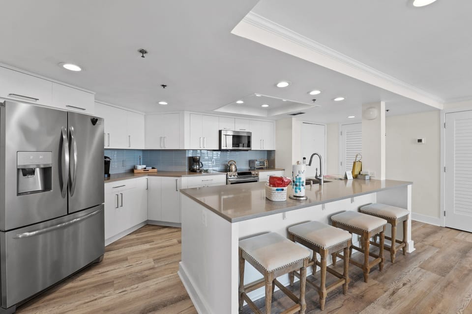 Fully Equipped Kitchen with Additional Seating.

Professionally Managed by
Breathe Easy Rentals