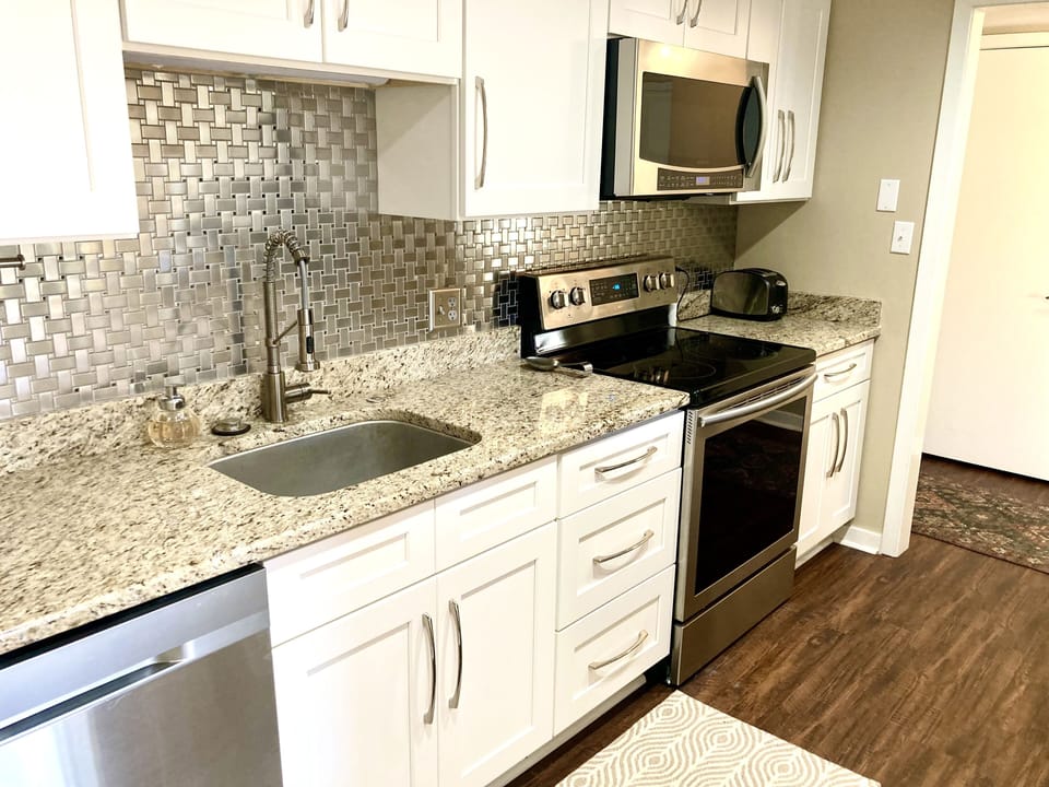 New appliances, new counters, new fixtures throughout.