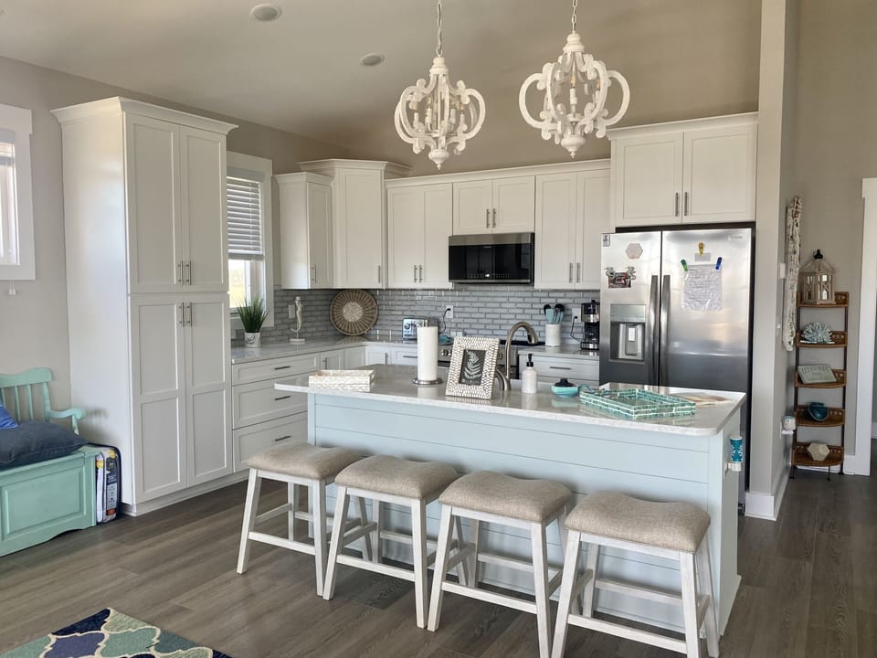 Open kitchen with brand new appliances including a built in air fryer!