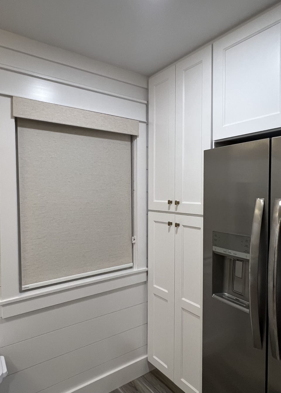 Huge pantry for all of your groceries. Custom roller shades throughout 