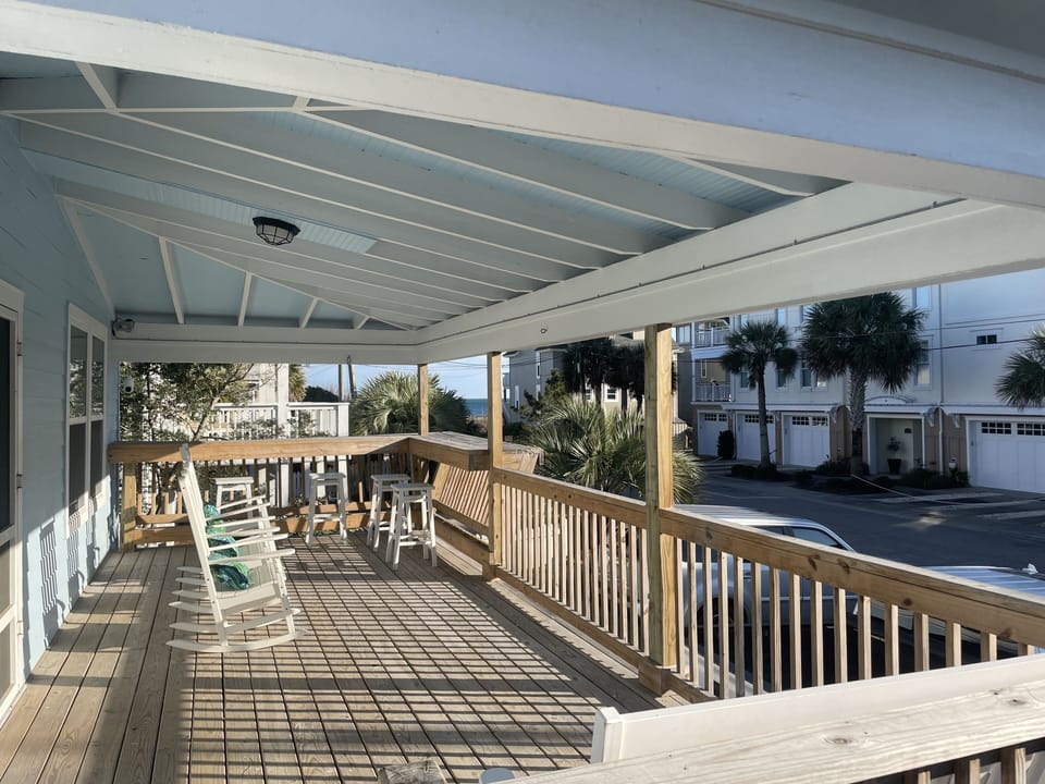 Front Porch    3 Rocking Chairs, 4 bench seats, and love seat.