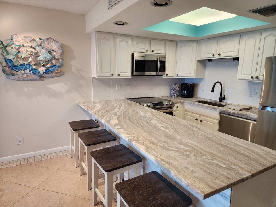 New Kitchen with granite counters, stainless steel applicances, fully equipped