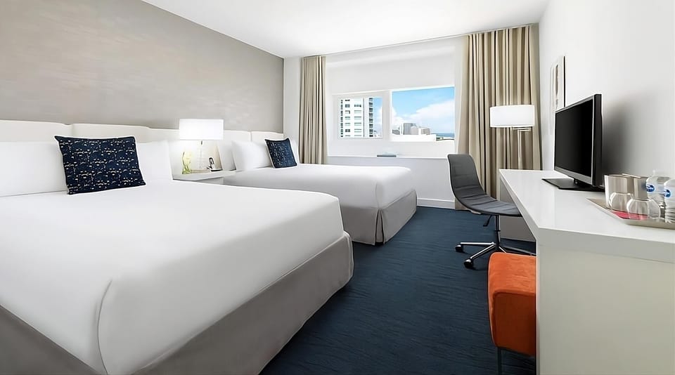 Settle in comfortably with two plush beds and workspace.